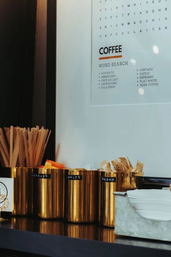 The coffee menu and word search at the counter